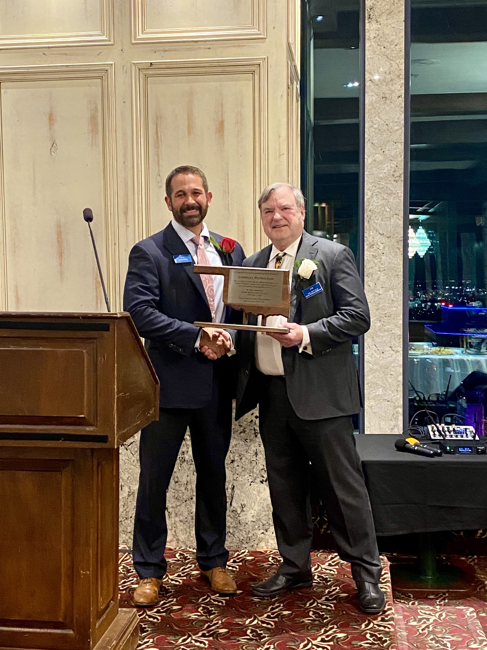 Oklahoma Energy Explorers presenting an honoree plaque to Crawley Petroleum Corporation