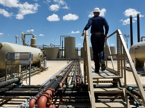 Oil and gas field technician at an Oklahoma production site